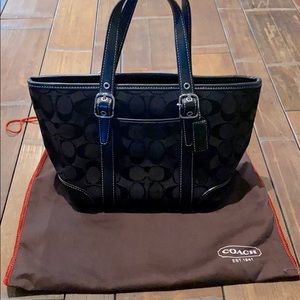 Previously loved authentic black COACH handbag